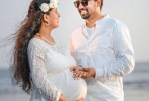 Expecting mother posing for a maternity photoshoot at Pratima Photo Studio in Thane, capturing the beauty of pregnancy.