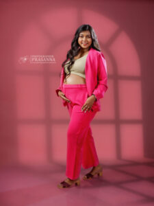 Expecting mother posing for a maternity photoshoot at Pratima Photo Studio in Thane, capturing the beauty of pregnancy.